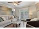 Comfortable living room with modern décor, ample seating, and access to outdoor patio at 4988 Meadow Ln, Marietta, GA 30068