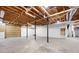 Unfinished basement with exposed ceiling and black support beams at 5233 Hayden Farms Dr, Powder Springs, GA 30127
