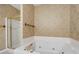 Bathroom featuring jacuzzi tub, shower with glass door and custom wallpaper at 5233 Hayden Farms Dr, Powder Springs, GA 30127