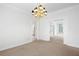 Bright dining area showcases stylish lighting and a seamless flow to other rooms at 5233 Hayden Farms Dr, Powder Springs, GA 30127