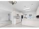 Bright kitchen featuring white cabinetry, stainless steel appliances, and a large island with a breakfast bar at 5233 Hayden Farms Dr, Powder Springs, GA 30127