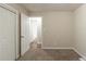 Bedroom features neutral paint, carpet and doorway at 388 Belgarde Se Pl, Atlanta, GA 30354