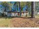 Charming single-story home with trees and lawn at 388 Belgarde Se Pl, Atlanta, GA 30354
