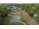Aerial view featuring a basketball court, baseball field, and tennis courts at 557 Winder Trl, Canton, GA 30114