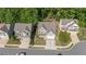 Aerial view of well-kept homes with landscaped yards, offering curb appeal and community charm at 557 Winder Trl, Canton, GA 30114