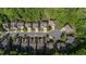 Expanded aerial view showing the community layout, including homes and streetscapes at 557 Winder Trl, Canton, GA 30114