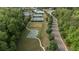 Aerial view of community amenities including tennis courts, pool, baseball and basketball fields at 557 Winder Trl, Canton, GA 30114