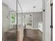 Bathroom showcases a glass enclosed shower and a vanity with wood-look flooring at 557 Winder Trl, Canton, GA 30114