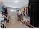 Spacious walk-in closet with custom shelving for optimal organization and storage at 557 Winder Trl, Canton, GA 30114