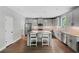 Modern kitchen featuring stainless steel appliances, granite countertops, and a spacious center island at 557 Winder Trl, Canton, GA 30114