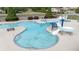 Aerial view of community pool, waterslide, and landscaped grounds at 557 Winder Trl, Canton, GA 30114