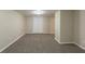 Finished basement with carpet and a double door closet at 761 Caron Nw Cir, Atlanta, GA 30318