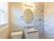 Recently renovated bathroom featuring an updated vanity, stone countertop, and tiled shower at 761 Caron Nw Cir, Atlanta, GA 30318