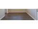 Unfurnished room featuring wood-look flooring and white trim at 761 Caron Nw Cir, Atlanta, GA 30318