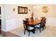 Inviting dining room featuring a large wooden table and classic decor at 1980 Beyers Landing Dr, Buford, GA 30519