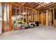 Spacious unfinished basement with exposed insulation, ready to be personalized at 3478 Spring Place Ct, Loganville, GA 30052