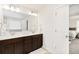 This bathroom features double sinks with a large framed mirror and great vanity at 3478 Spring Place Ct, Loganville, GA 30052