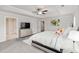 This main bedroom features an ensuite entrance, windows, and neutral walls at 3478 Spring Place Ct, Loganville, GA 30052