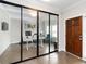 Modern office with glass partitions, sleek desk, and comfortable chair at 3478 Spring Place Ct, Loganville, GA 30052