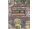 Stone entrance sign for Ozora Lake community at 3478 Spring Place Ct, Loganville, GA 30052