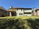View of the back of the house, featuring a wood deck, and green lawn at 3963 Lucas Ln, Ellenwood, GA 30294
