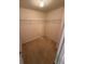 Neutral colored walk-in closet includes wire shelving, carpeted floor, and a light fixture at 3963 Lucas Ln, Ellenwood, GA 30294