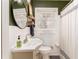Cozy bathroom features a classic white sink, toilet, and shower with stylish fixtures at 4162 Brownlee Dr, Tucker, GA 30084