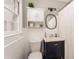 Well-lit bathroom featuring white subway tile, modern vanity, and medicine cabinet at 4162 Brownlee Dr, Tucker, GA 30084