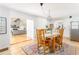 Open concept home featuring dining area and living space with wood floors at 4162 Brownlee Dr, Tucker, GA 30084
