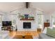 Bright and airy living room with stone fireplace and backyard view at 4162 Brownlee Dr, Tucker, GA 30084