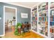Cozy living room showcasing hardwood floors, built-in bookshelves, and neutral-toned walls at 4162 Brownlee Dr, Tucker, GA 30084