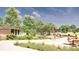 Scenic park rendering featuring paved walkways, lush greenery, mature trees, and comfortable seating areas at 4162 Brownlee Dr, Tucker, GA 30084