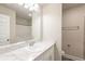 Bathroom vanity with shower and commode visible at 417 Flowery Branch Ct, Villa Rica, GA 30180