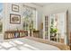 Cozy bedroom with a bookcase, bright window, and sitting area at 1 S Prado Ne # 15, Atlanta, GA 30309
