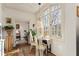 Bright dining area showcases a table set near a large window, offering a view of outdoor scenery at 1 S Prado Ne # 15, Atlanta, GA 30309