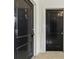 Two black doors numbered 16 and 15 in a hallway with neutral carpeting at 1 S Prado Ne # 15, Atlanta, GA 30309