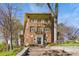 Beautiful brick condo building exterior with mature trees, garden, and brick steps at 1 S Prado Ne # 15, Atlanta, GA 30309