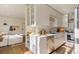 Modern kitchen featuring sleek white cabinets, stainless steel appliances, and seamless integration with the living area at 1 S Prado Ne # 15, Atlanta, GA 30309
