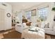 Bright living room boasts a comfortable white sectional couch and plenty of natural light at 1 S Prado Ne # 15, Atlanta, GA 30309