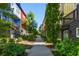 Charming street view of colorful townhomes with well-maintained landscaping at 140 Color Cir, Atlanta, GA 30317