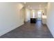 Open-concept living area with wood floors, recessed lighting, and a modern kitchen island at 140 Color Cir, Atlanta, GA 30317