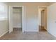 Bright bedroom features a large closet and neutral carpeting at 3475 Glensford Dr, Decatur, GA 30032