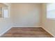 Open dining area with wood floors and natural light, adjacent to kitchen at 3475 Glensford Dr, Decatur, GA 30032