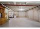 This unfinished basement is a blank slate for storage and potential finishing projects at 1218 Lanier Springs Dr, Buford, GA 30518