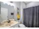 Well-lit bathroom showcases a shower-tub combination and tasteful decor, perfect for a clean, modern feel at 1218 Lanier Springs Dr, Buford, GA 30518