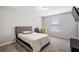Neutral bedroom with carpeted floors, natural light, and simple furnishings at 1218 Lanier Springs Dr, Buford, GA 30518