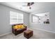 Bright bedroom with neutral carpet and a stylish view of a kitchen enhancing the home's open feel at 1218 Lanier Springs Dr, Buford, GA 30518