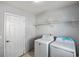 Spacious laundry area with modern appliances and ample storage at 1218 Lanier Springs Dr, Buford, GA 30518