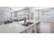 Open-concept living space featuring a comfortable sectional sofa, lots of natural light and sliding doors to the backyard at 1218 Lanier Springs Dr, Buford, GA 30518