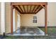 This covered patio is perfect for outdoor living at 1218 Lanier Springs Dr, Buford, GA 30518